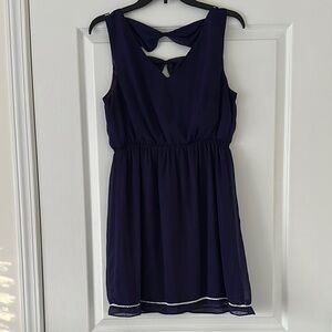 Stylish Purple Sleeveless Dress with Bow Detail